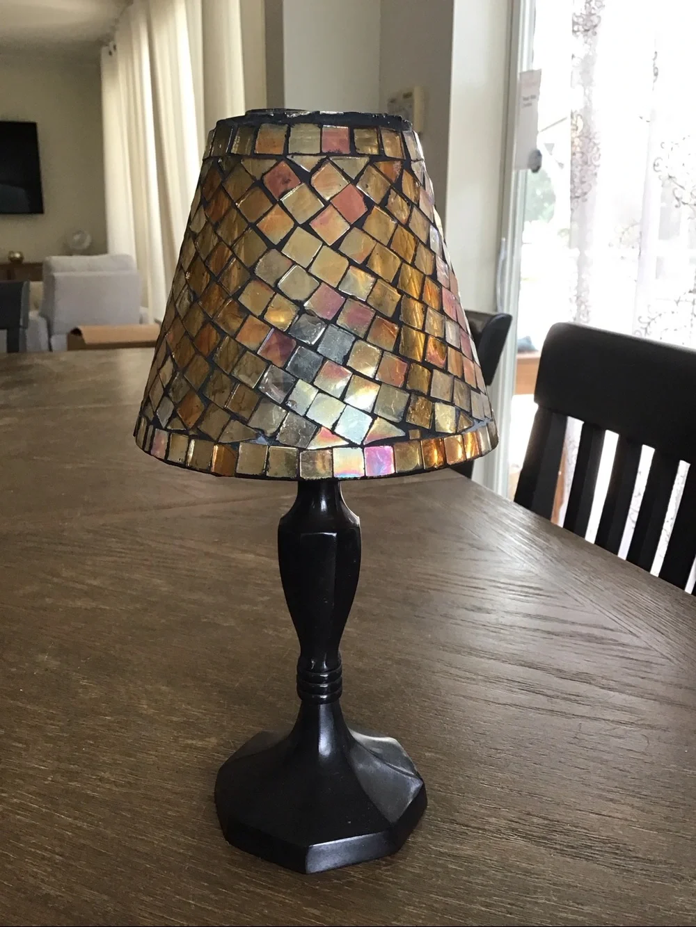 Mosaic tealight candle lamp featuring a stained glass shade.